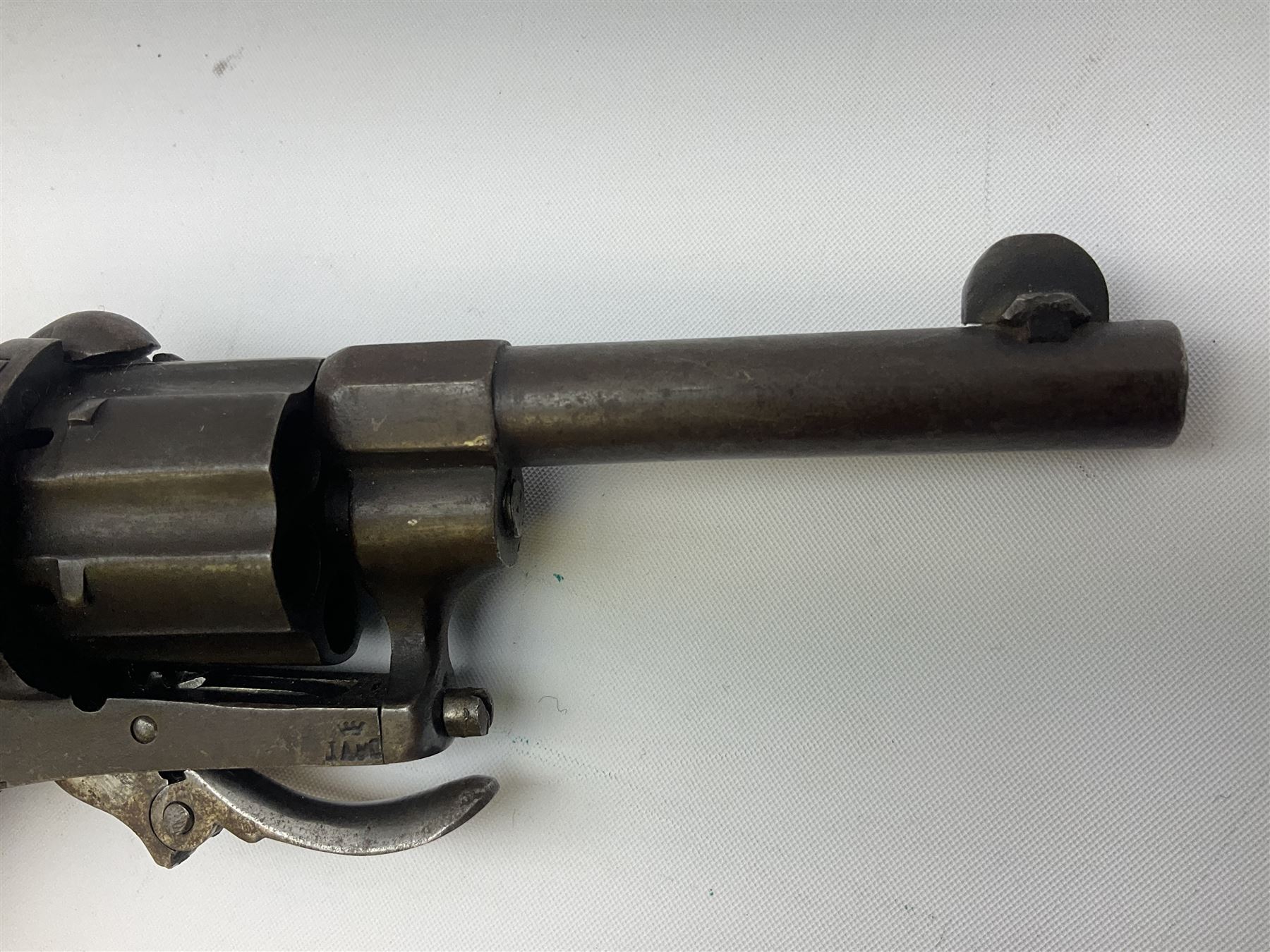 19th century Belgian Flobert 7mm pin-fire revolver with six-shot cylinder, 7cm octagonal to round barrel, folding trigger and walnut stock incorporating ejector rod in butt L18cm overall