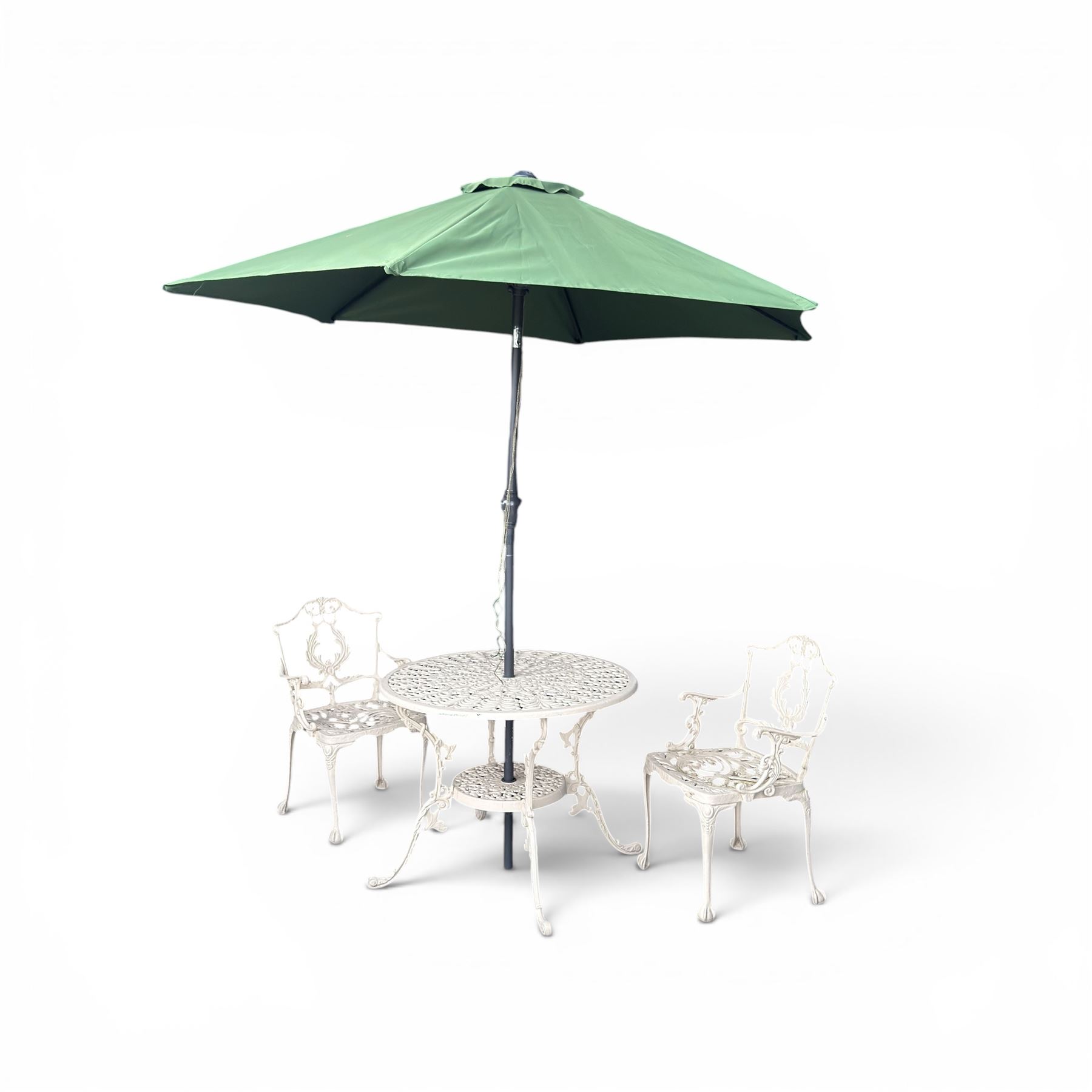 Victorian design cast aluminium garden table and twin armchairs featuring a pierced floral wreath splat, over a stylised scrolling acanthus leaf seat, including parasol