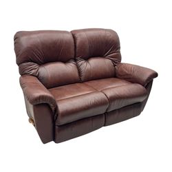 La-Z-Boy - manual reclining three piece suite - two seater sofa (W165cm, H105cm); and two armchairs (W98cm), upholstered in brown leatherette