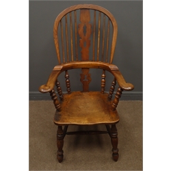  19th century elm broad arm Windsor chair, shaped and pierced splat and stick back, dished seat, turned supports with double 'H' stretcher base  
