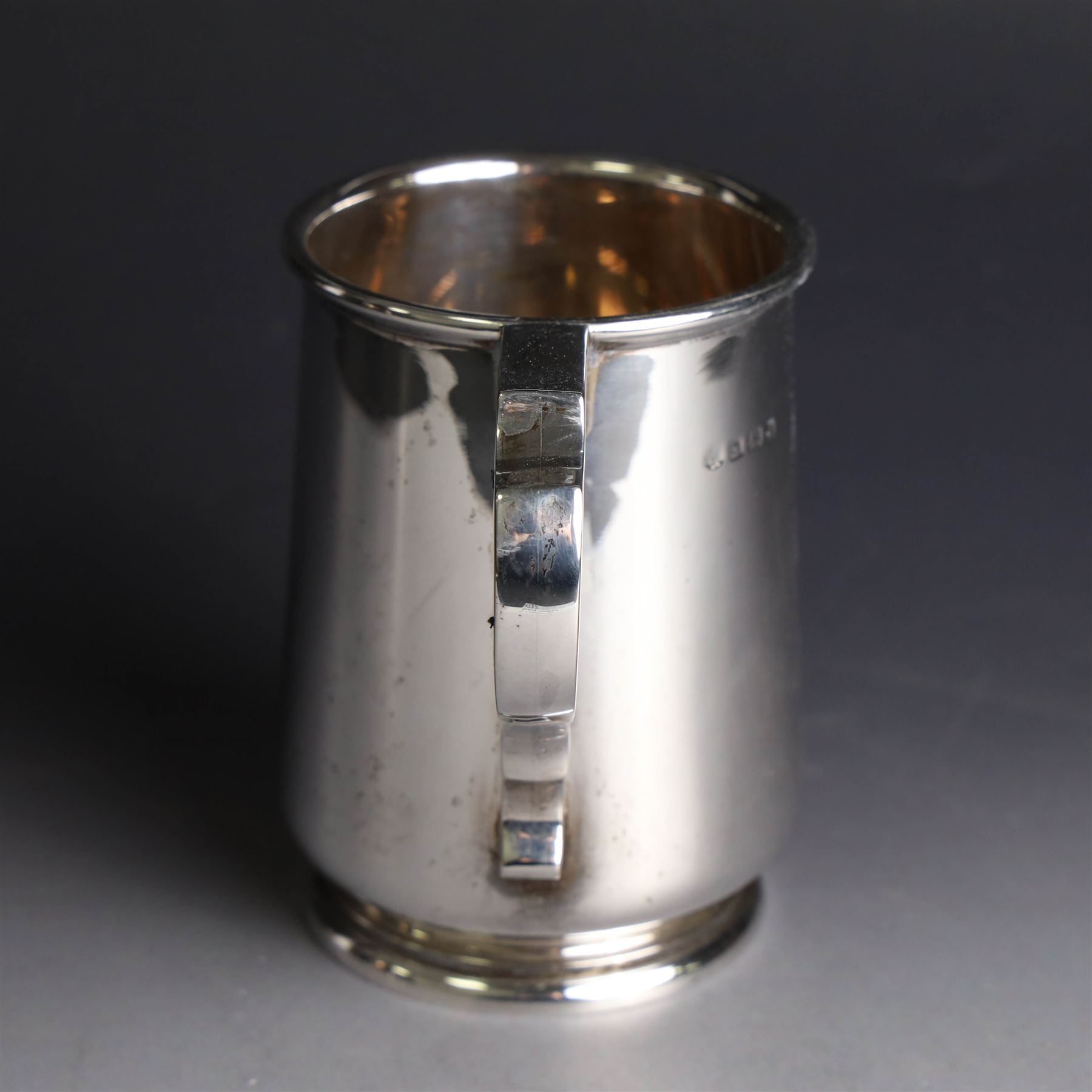 1930s silver christening mug, of slightly tapering cylindrical form and C scroll handle, engraved with initials to body, hallmarked Birmingham 1933, maker's mark worn and indistinct, H10cm