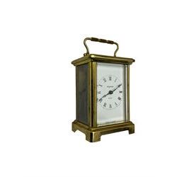  20th century French cornice “Bayard” 8-day timepiece carriage clock, with a lever platform escapement, enamel dial with roman numerals and minute track and Haller Torsion clock with acrylic dome
