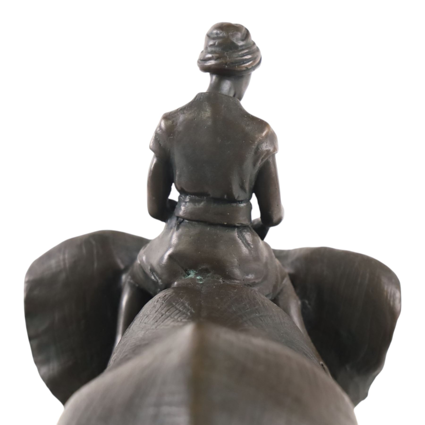 Bronzed figure of an Indian Elephant with rider, H24cm