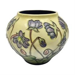 Moorcroft vase of squat globular form, in Hepatica pattern, designed by Emma Bossons, impressed and painted marks beneath, H12cm