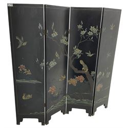 Chinese four-panel folding room screen, black lacquered with a naturalistic scene decorated with trees, birds and flowers