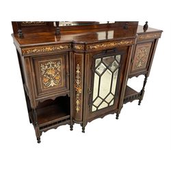Victorian inlaid rosewood mirror back display cabinet, the shaped arched pediment  over central cabinet enclosed by astragal glazed doors, turned and reed carved upright supports, fitted with bevelled glass mirror plates, the break-front lower section with moulded top over bevel glazed mirror door, inlaid profusely with scrolling foliage, on turned feet