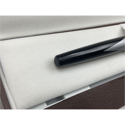 Circa 1930s Mentmore Auto Flow button fill fountain pen, the black barrel and cap with single narrow band and gold nib stamped Osmi Ridium 14ct, together with two gold nib fountain pens, each marked Huahong, the first stamped 14K 580, and second stamped 8K, both housed in Mentmore boxes (3)