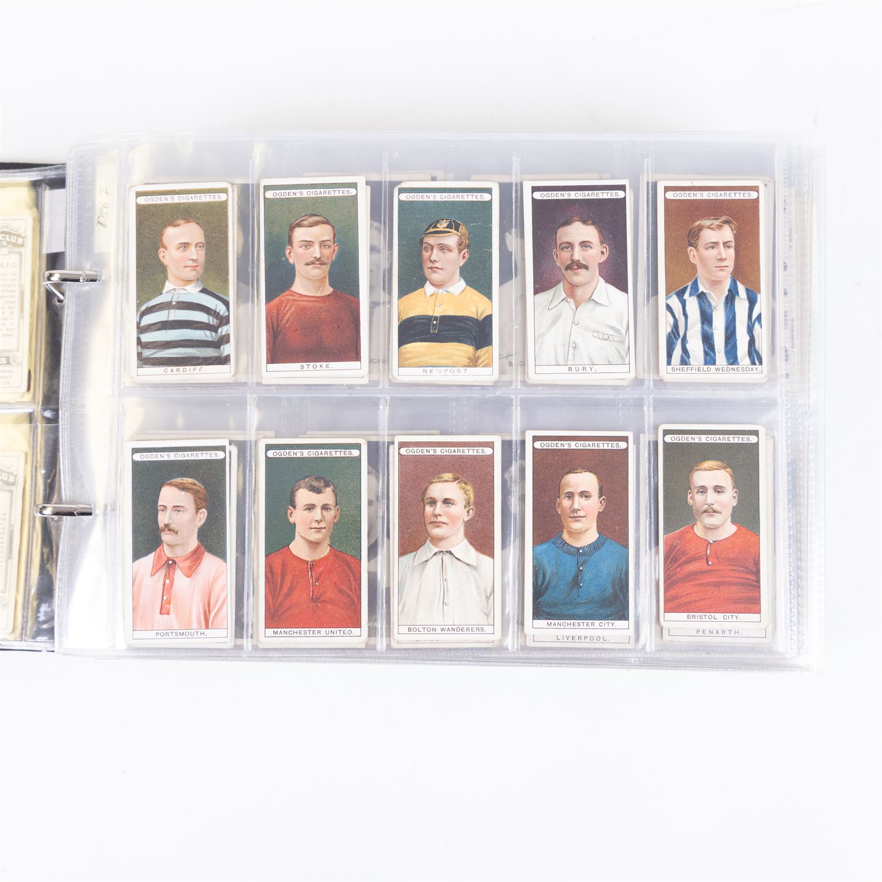 Collection of Edwardian and later Football related trading and cigarette cards, including forty-nine of fifty 1906 Ogden's Football Club Colours, 1922 PALS Footall series, ninety of one hundred 1925 Gallaher Famous Footballers, complete set of forty-four 1926 Ogden's Captains of Association Football Clubs and Colours, complete set of fifty 1927 Players Football Caricatures by MAC,  complete set of fifty 1927 Players Football Caricatures by RIP,  complete set of fifty 1930 Players Association Cup Winners, complete set of 50 1933 Ogdens AFC Nicknames etc, housed in brown cigarette card album