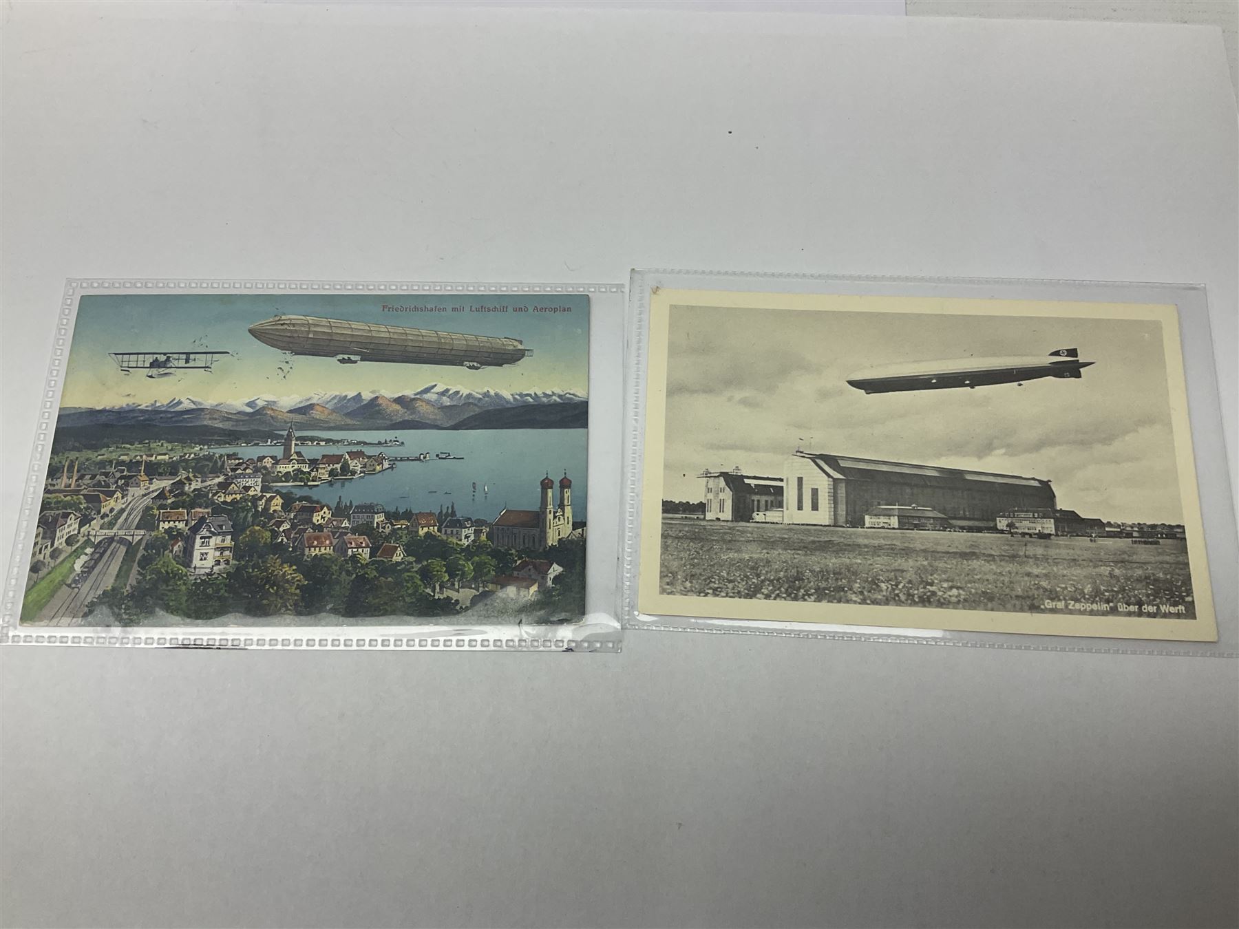 Collection of twenty six postcards depicting Airships/Zeppelins, including two pairs depicting the tragedy of the R.38. wrecked over Hull August 24th 1992, many unused.