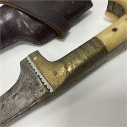 Afghan Khyber knife (Choora), blade engraved along the top edge with ornate brass and bone grip, with leather scabbard, overall L31cm, blade L20cm