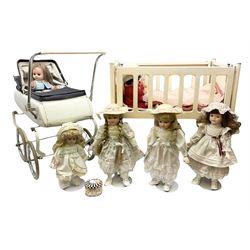 Toy doll's crib, together with Triang toy pram and seven dolls, crib H59cn
