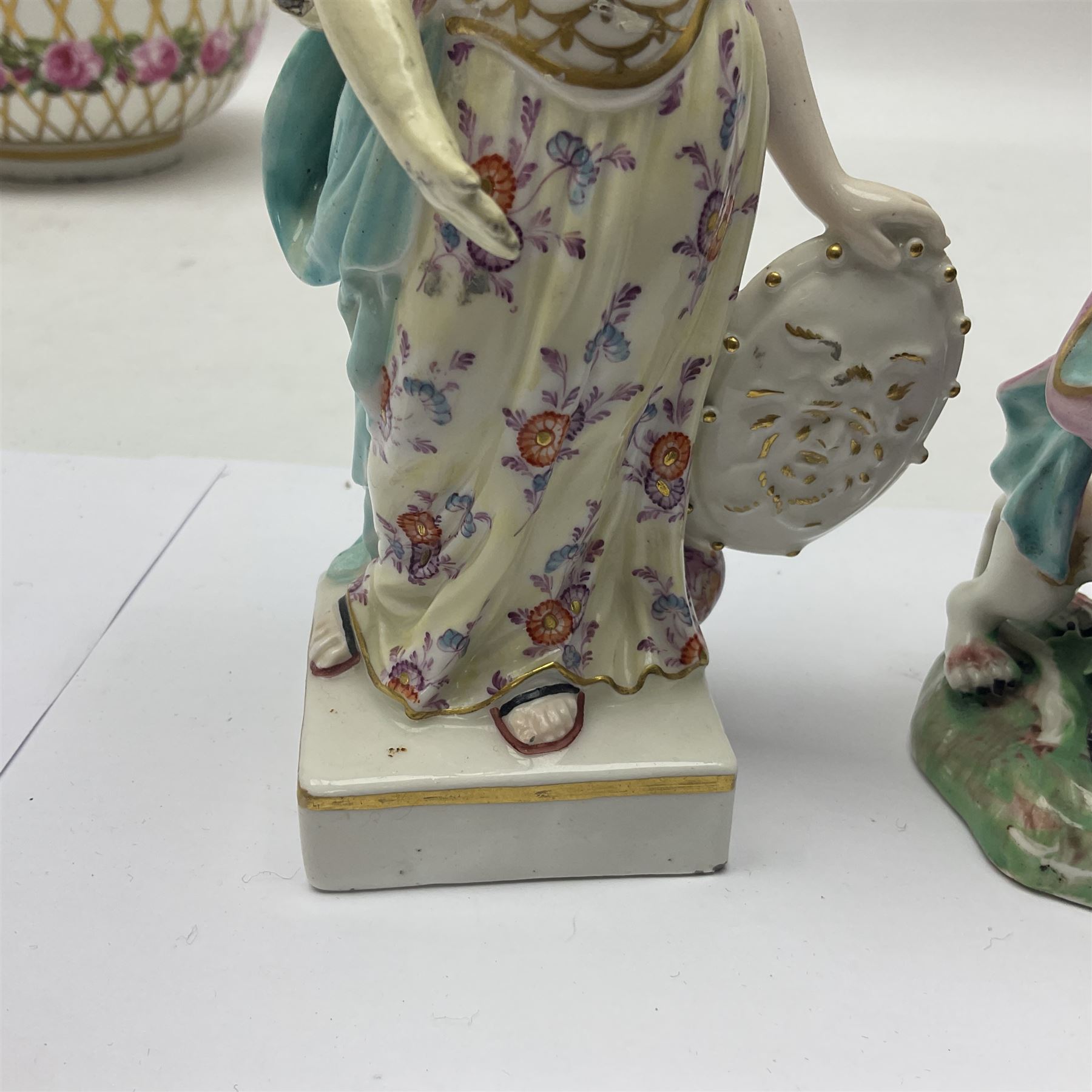 Group of 18th and 19th century ceramics for repair and restoration, to include an 18th century Derby figure emblematic of the Continent of Africa, pair of small 19th century Derby vases, painted with birds and floral spray, 19th century Derby slop bowl decorated in the 594 pattern with pink roses against gilt trellis, 19th century Derby figure of a recumbent deer, Serves style box, and two further figures