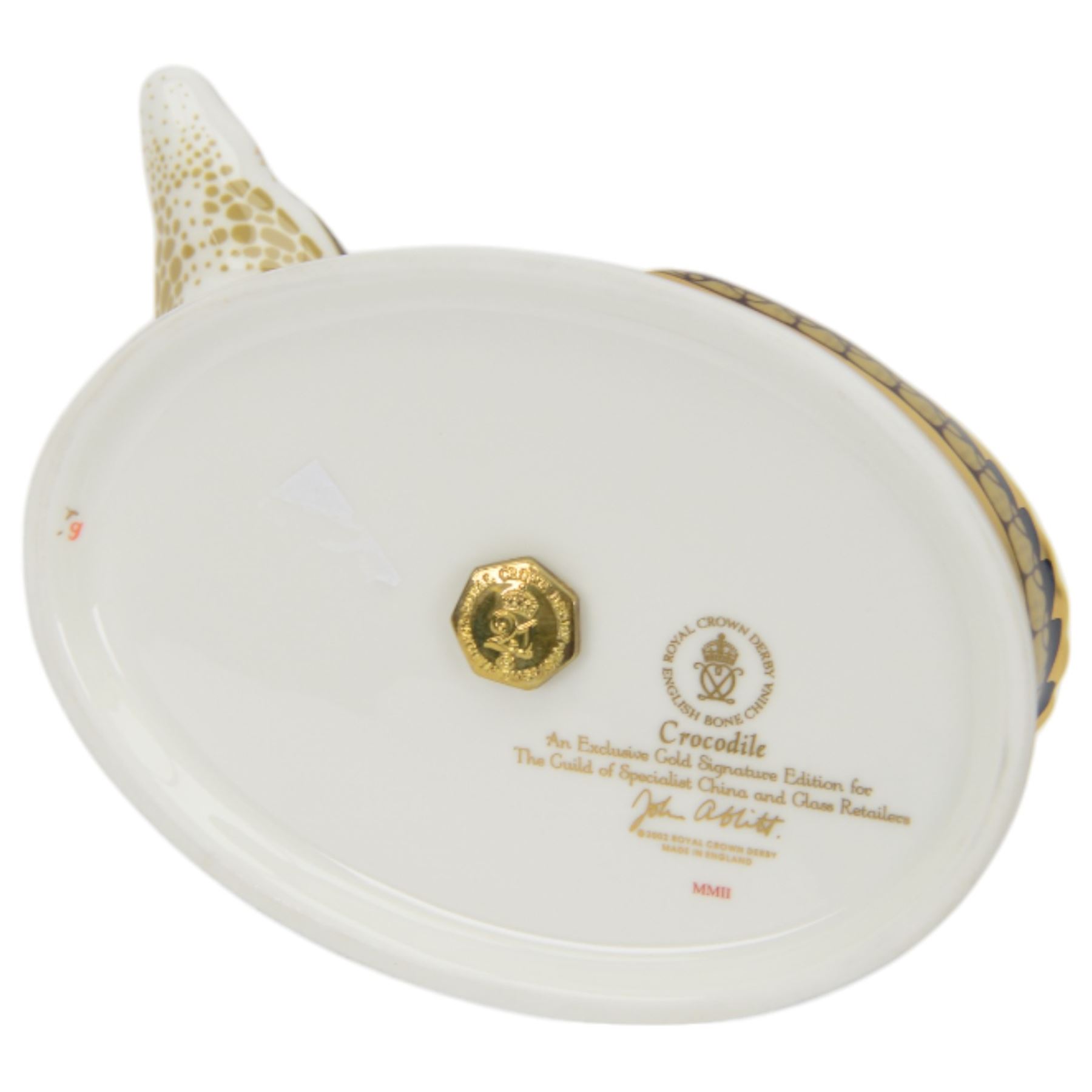Two Royal Crown Derby paperweights, comprising Crocodile, with gold stopper and original box and Imari Dragon with gold stopper  