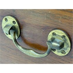 Zanzibar chest, early 20th century, of hardwood construction with brass inlaid foliate and geometric decoration to the lid, fitted interior of multiple carved compartments, with brass strapwork, side handles, and shaped bracket feet