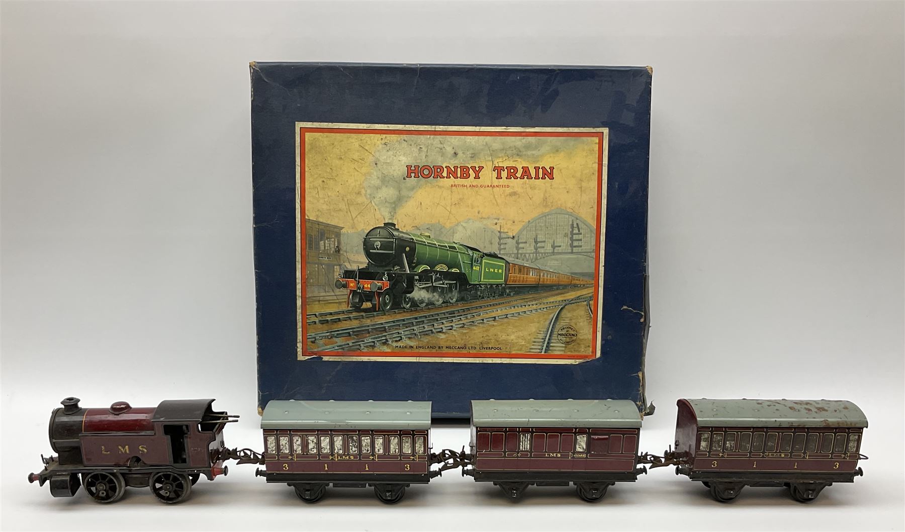 Hornby '0' gauge - Passenger Set No.21 with clockwork No.20 type 0-4-0 tender locomotive No.60985, two coaches and track, boxed; and Tank Passenger Set No.101 for spares or repair with clockwork No.101 type 0-4-0 tank locomotive No.2270, three coaches and track, boxed (2)
