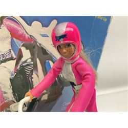 Ideal Derry Daring and Her Trick Cycle, with clothed figure on trick cycle and winder; in original illustrated box dated 1975