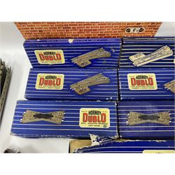 Hornby Dublo - quantity of three-rail track; six Isolating Switch Points and four Diamond Crossings; all boxed; two passenger coaches and three goods wagons; unboxed; etc