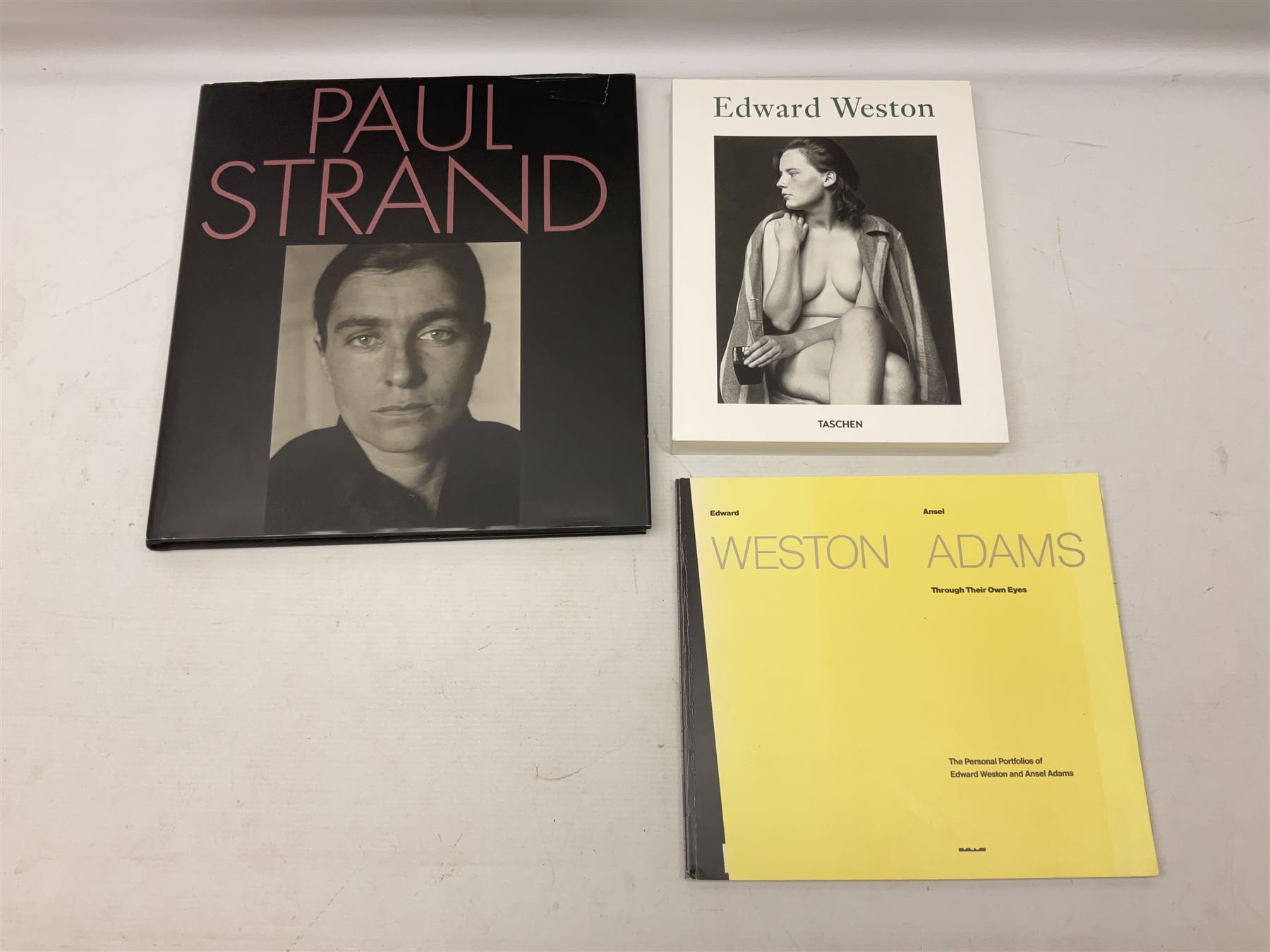 Seven photography reference books, to include Edward Weston, Paul Strand, Alfred Stieglitz, Sam Haskins etc 