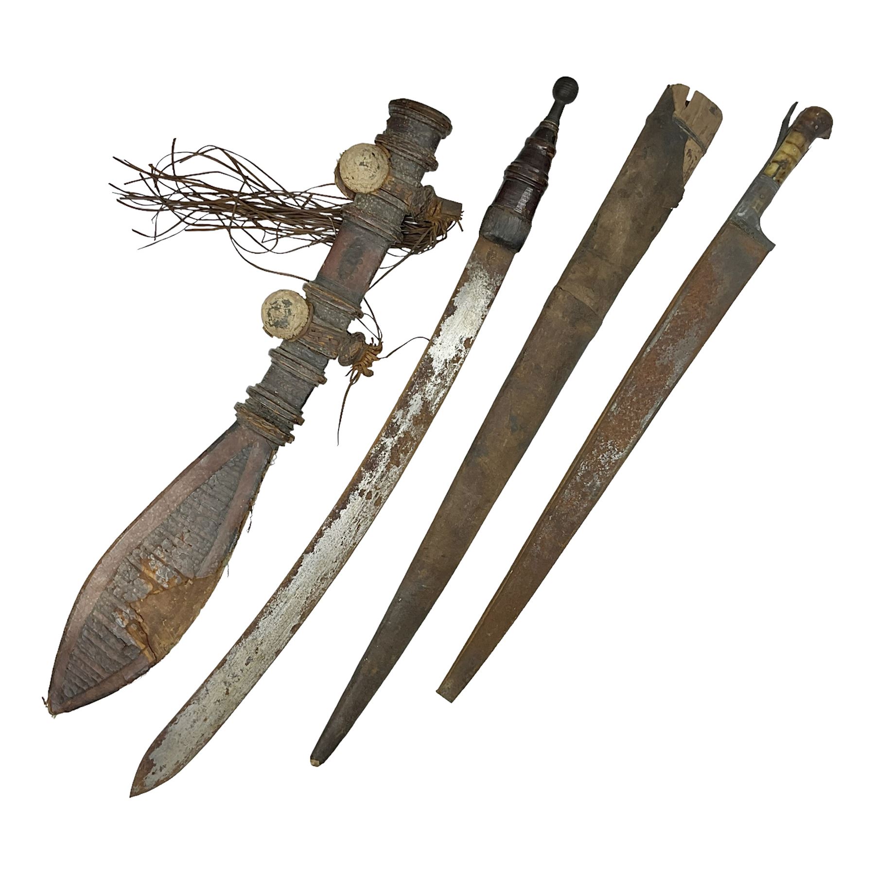 Mandingo sword, the 63cm plain curving steel blade marked with a horses head and the initials G.S.; leather covered grip with metal ribbed spherical pommel; in decorative leather leaf scabbard mounted with tassels and roundels L84cm overall; and a North African flyssa sword in poor condition with wooden scabbard (2)