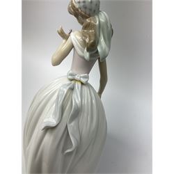 Large Lladro Figures, Spring Splendor, designed by Regino Torrijos, model number 5898, H30.5cm, the glass slipper, designed by Jose Puche, model number 5957, H29cm and Breathless, designed by Juan Ignacio Aliena, model number 6430, H31cm.