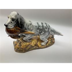 Royal Doulton model of an English setter carrying a pheasant, HN 2529, designed by Frederick Daws H21cm, L27cm.