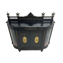 Victorian ebonised credenza side cabinet, raised balustrade back with urn finials and a central carved cartouche, carved and gilded with floral garland decoration, central doors with gilt panels painted with figures sitting over a lake enclosing two shelves, flanked by applied bellflower detail and glazed bow-front side doors, raised on ring turned feet with castors
