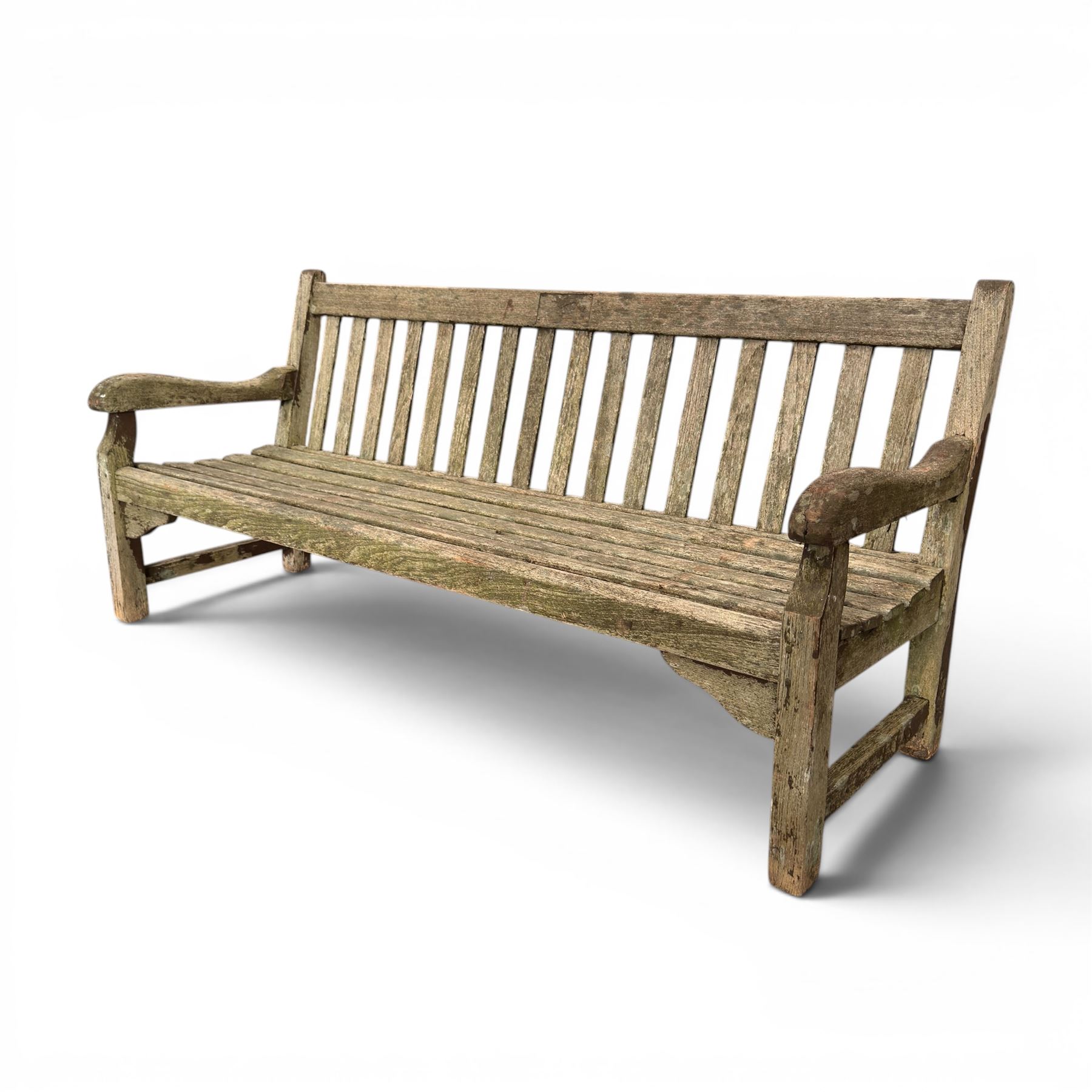 Teak garden bench with slatted back and seat raised on square supports