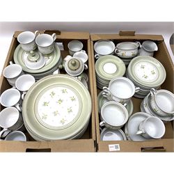 Quantity of Denby Verona pattern tea and dinner wares, decorated with floral sprays and within green borders, to include lidded twin handled bowls, teacups and saucers, dinner plates etc in two boxes