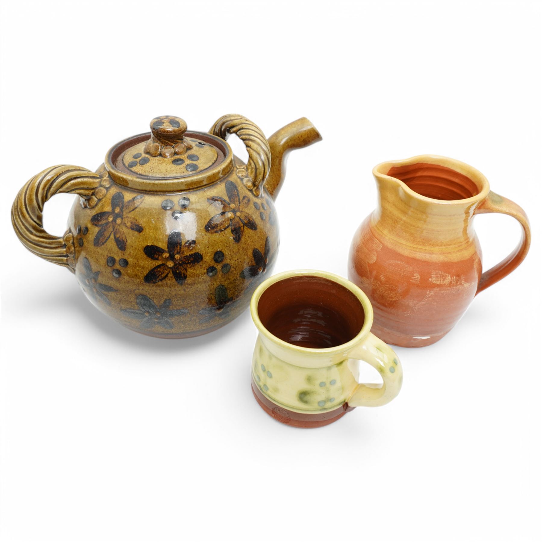 Peter Dick for Coxwold Pottery stoneware teapot decorated with flower heads, Coxwold Pottery mug and a Thornton Pottery jug
