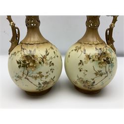 Pair of Turn Vienna blush ivory ewers decorated with floral sprays and gilt, H25cm