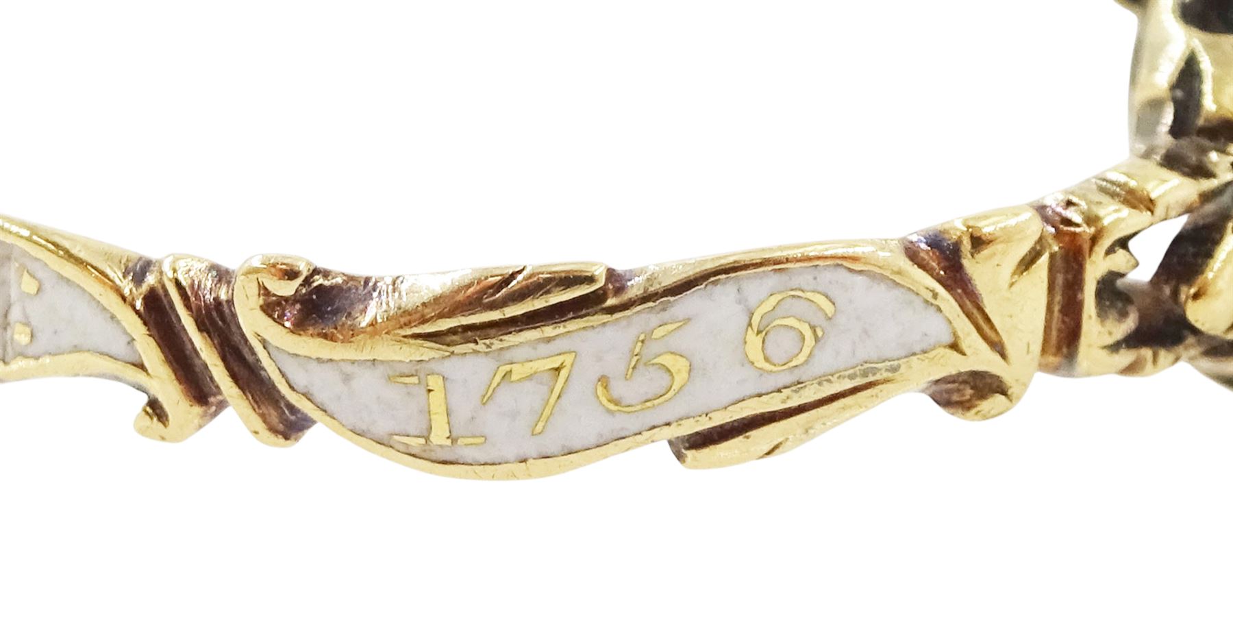 George II 18ct gold amethyst and enamel mourning ring, single cushion cut amethyst, with foiled and glazed back, to pierced fleur-de-lis shoulders, the white enamelled shank engraved Grace Hutchinson OB: 13 Dec: 1756