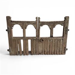 Pair of 19th century weathered wooden ecclesiastical church gates, the cresting rail over ...