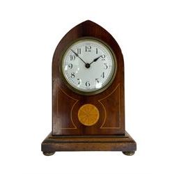 Mahogany cased Lancet clock c1910 with an inlaid cartouche and satinwood stringing, white enamel dial with Arabic numerals and steel spade hands, eight-day french movement with a cylinder platform escapement. With key.