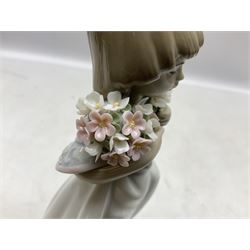 Three Lladro figures comprising, Pocket Full of Wishes no 7650, School Days no 7604 and Spring Bouquets no 7603, all with original boxes, largest example H26cm  