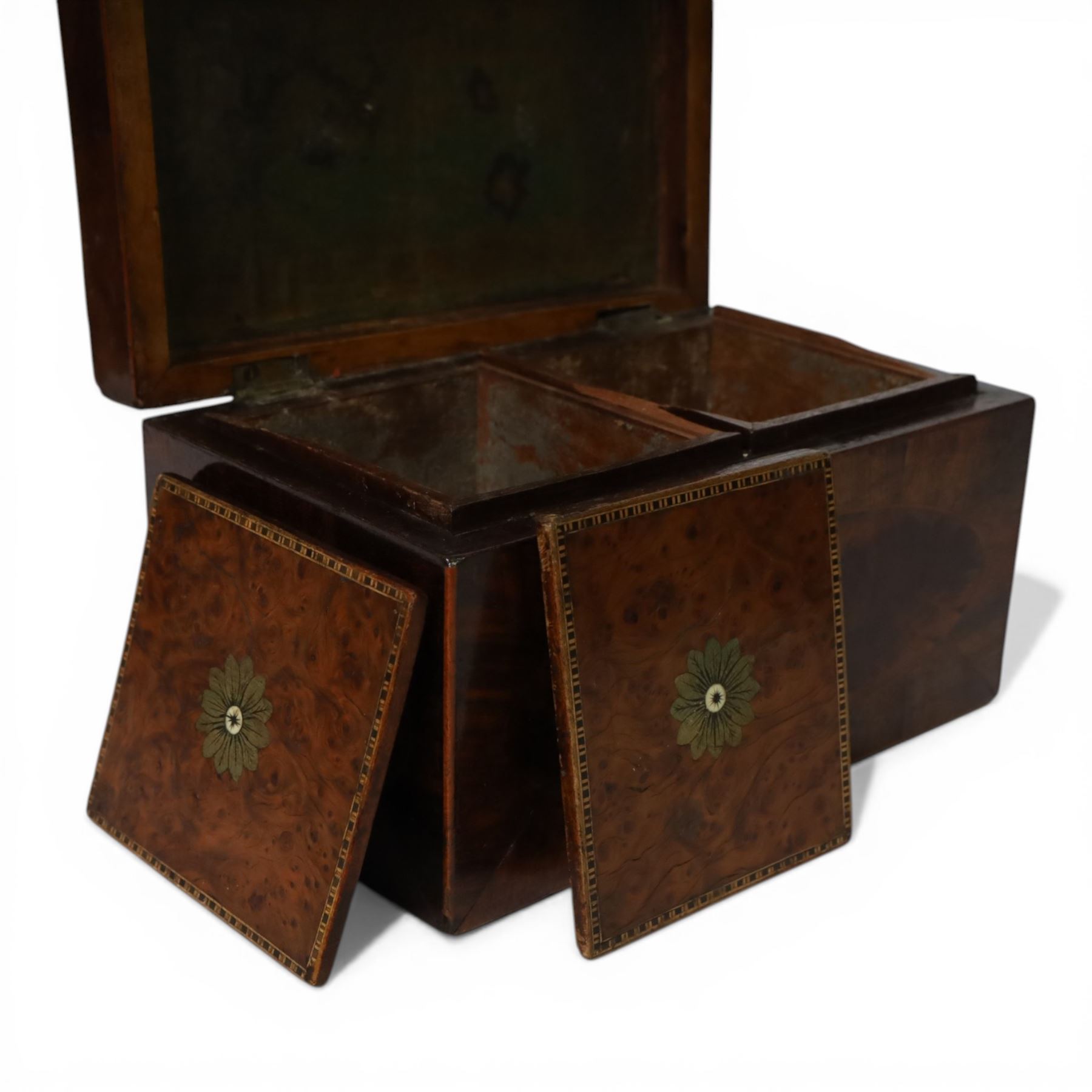19th century tea caddy of rectangular form, with brass handle, the hinged lid opening to  reveal two compartments, with lids of burr wood veneer with inlaid floral decoration, H12cm, L20cm, H12cm