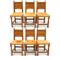 Gnomeman - set of six oak dining chairs, the adzed panelled backs with chamfered rails, ov...