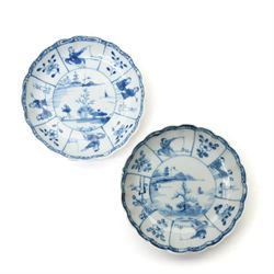 Pair of Chinese Kangxi period blue and white lobed dishes decorated with panels of fishermen, and another painted with a traditional scene, unmarked, D11.5cm; together with a Chinese millefleur dish, painted externally with bats, apocryphal Qianlong marks in red to base, D14.5cm (4)