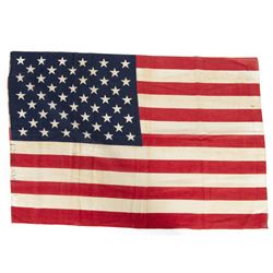 Vietnam War; two North Vietnamese military flags, together with a United States Marine Corps Vietnam period stars and stripes flag 