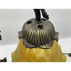 Art Nouveau style lamp in the form of a woman on a swing, with a green mottled shade, upon a marble base H52cm