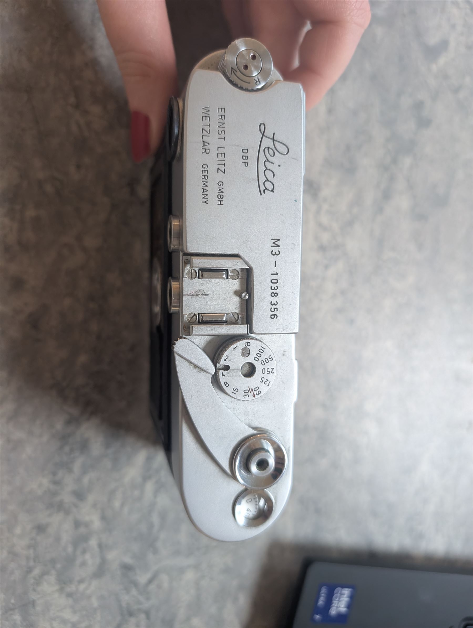 Leica DBP M3 35mm rangefinder camera body, serial no. 1038356, circa 1961, in chrome finish, housed in brown leather Leica case, with a Leitz Wetzlar Sunnilux 1:1.4/50 lens serial no. 1845148, Leitz Wetzlar Elmar 1:4/135 lens serial no. 1825980, 12575N hood, 12521G hood, Leica Meter MC serial no. 99015, Sunpak Auto28 SR Thyristor, Linhof 3 Way Pan tripod, and a Toshiba PE-1 Linear Exposure meter, all housed in an Original Benser Everready Case, most items with instruction booklets 