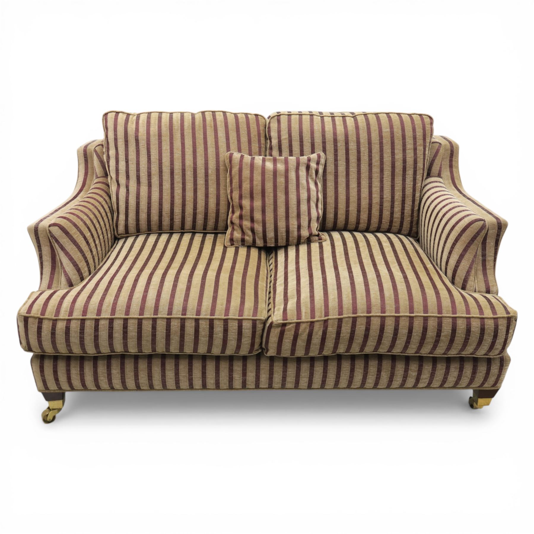 Late 20th century fabric upholstered sofa, with loose back and seat cushions, broad padded arms with piped borders, upholstered in striped textile, raised on concealed feet