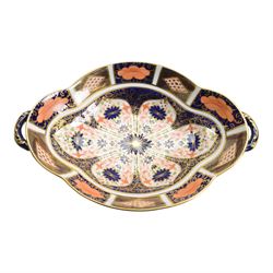 Royal Crown Derby imari patter 1128, six coffee cups and saucer, one side plate and oval twin handled dish