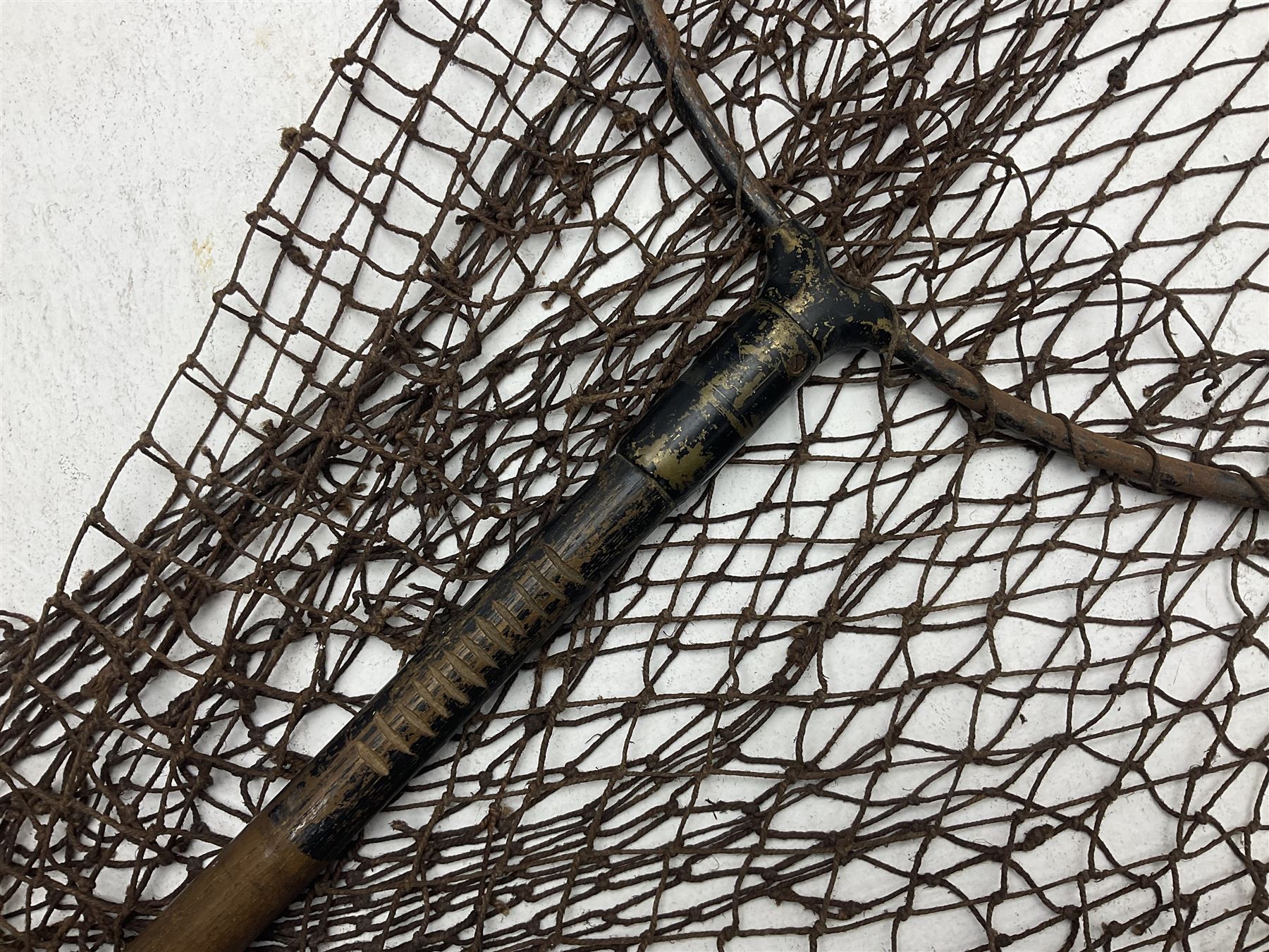 Fishing tackle and accessories housed in two wicker creels, including a landing net, fly tin, small brass reel, other reels to include two Intrepid Boy'o examples, crab lines etc 