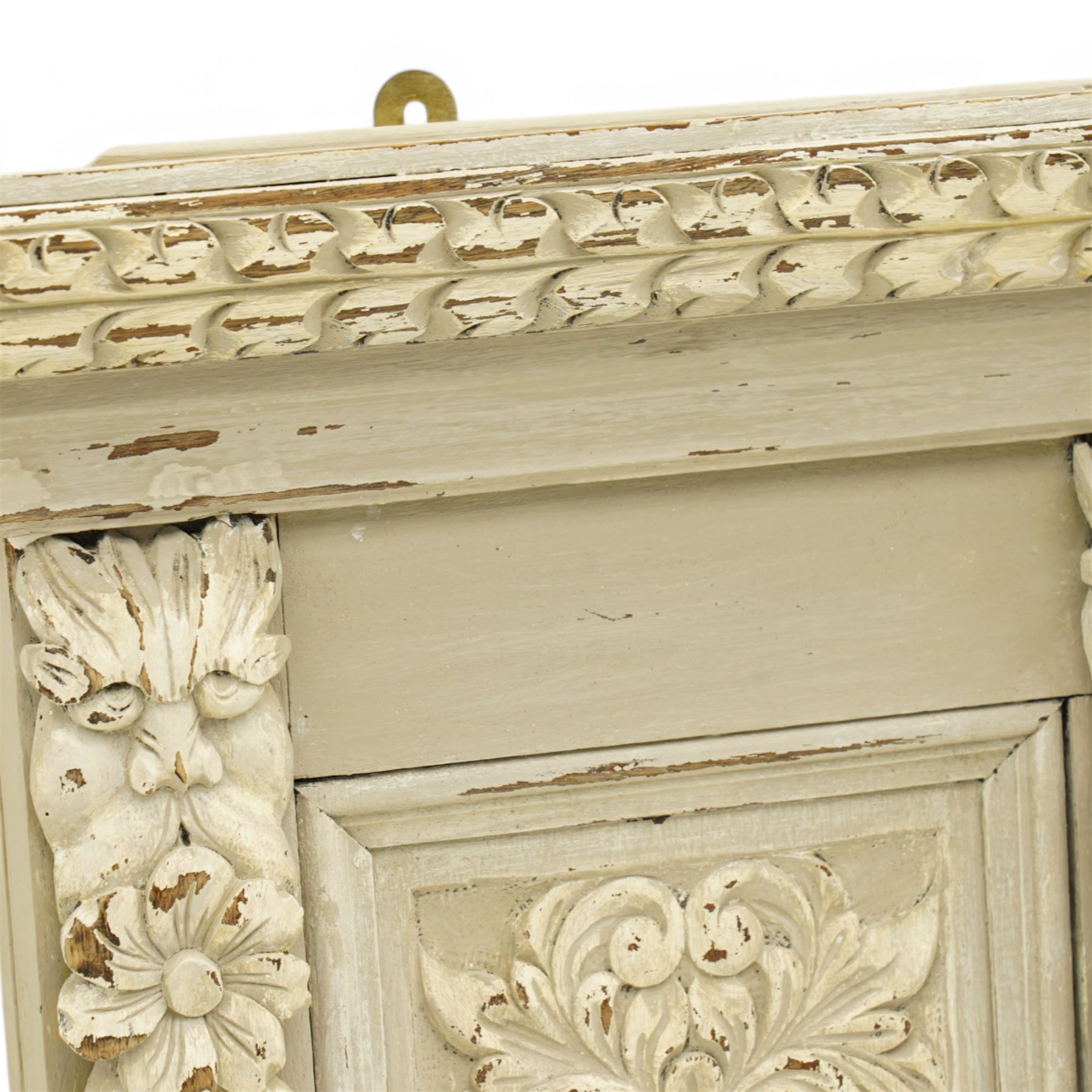 Victorian heavily carved oak wall mirror in distressed grey paint finish, moulded and chip carved cornice over central bevelled mirror and panelled front, the panels carved with urns and scrolled foliage, the uprights with fruiting foliage carved mounts 