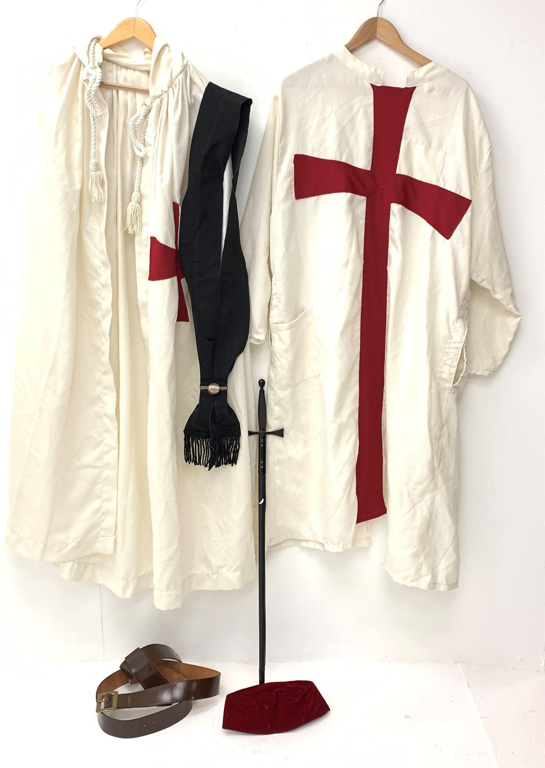 Masonic Knights Templar uniform, comprising hooded cape, ceremonial sword marked AR Fabb Bros Ltd, cap, sash, and belt.