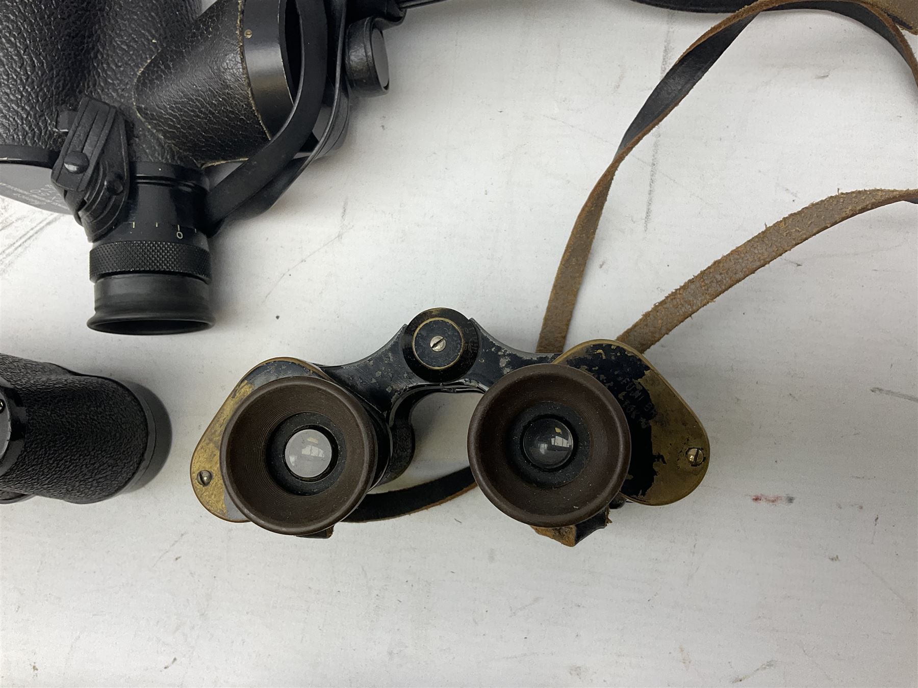 Quantity of binoculars for spares and repair, to include Cogswell & Harrison Primic 8x30, Prinz 8x30, Telstar 35x60, Zeiss Wetzland 8x40 etc