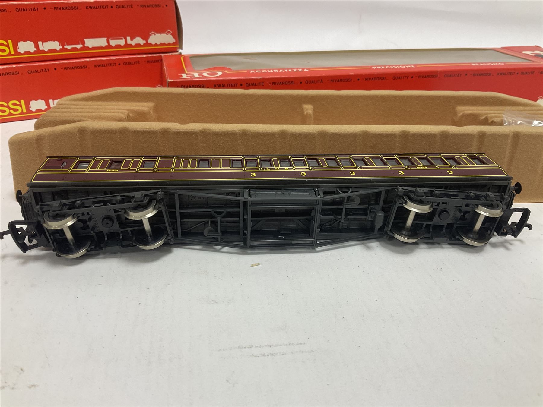 Rivarossi ‘HO’ gauge - 1348 4-6-0 ‘Royal Scot’ steam locomotive and tender no.6100 and four carriages comprising 2933, two 2934 and 2935 in maroon; in original boxes (5) 