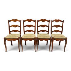 French cherry wood extending dining table, rectangular top on square chamfered supports with two additional leaves; with Batheaston - set of eight cherry wood waived ladder back dining chairs with rush seats (W46cm H98cm)