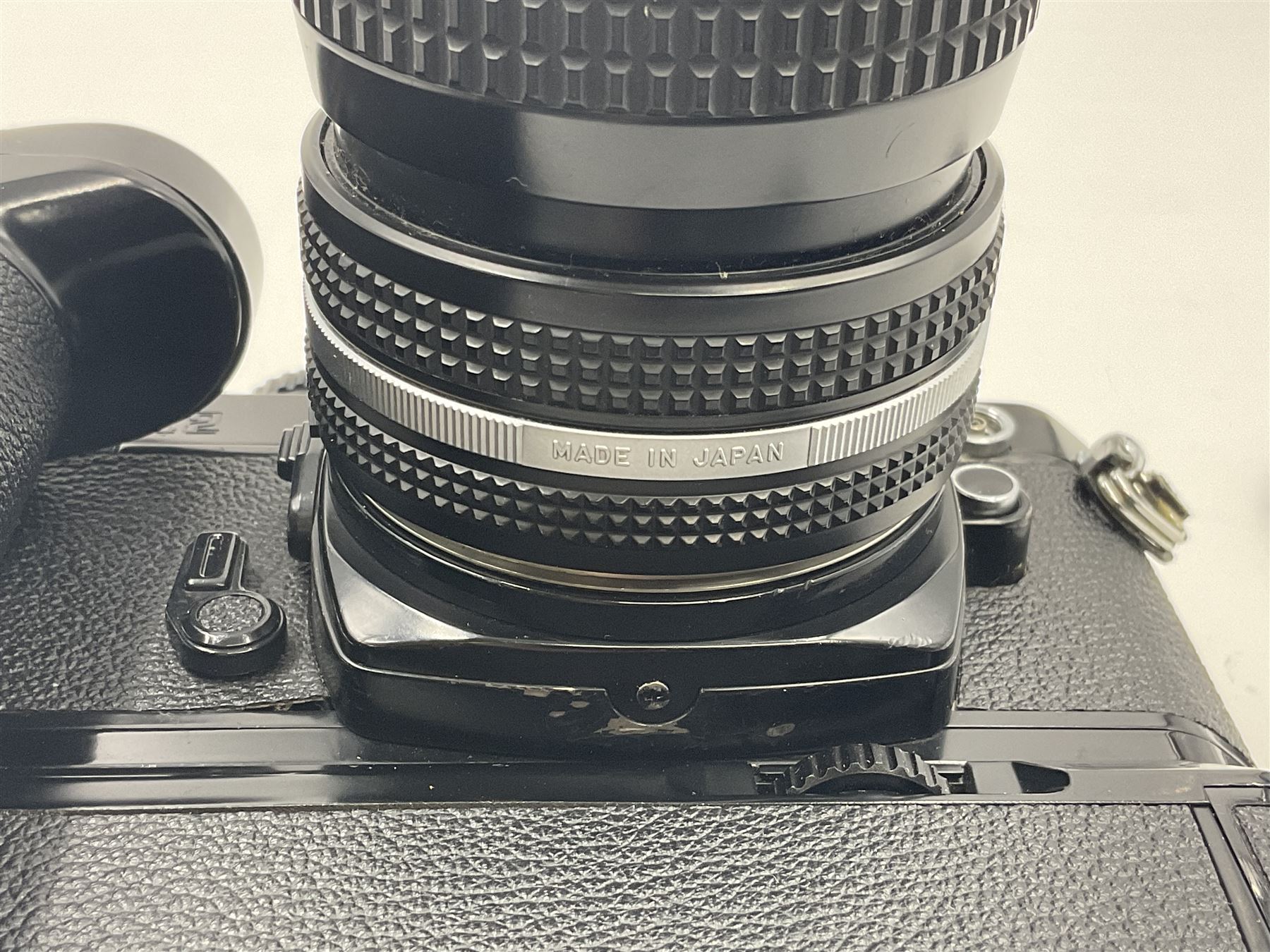 Nikon FM2n camera body, serial no. N8683100, with 'Nikon Zoom-NIKKOR 35-70mm 1:3.3-4.5' len, serial no. 2236565, Nikon MF-16 data back, serial no. 212905 and Nikon MD-12 Motor Drive, serial no 1570382 