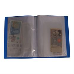 Great British and World banknotes, including many uncirculated examples, housed in ten folders